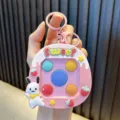 Pink silicone rabbit and strawberry fidget toy keychain cute game console pendant - Pink