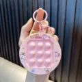 Rosa Einhorn Quick Push Fidget Toy Schlüsselanhänger mit 9 Pop-Blasen zum Stressabbau. - Rosa