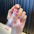 Simpatico portachiavi Capibara liquido con sabbie mobili e cinturino rosa glitter - Pink Square - Sports Style