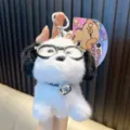 Zachte pluche puppy sleutelhanger met bril en zilveren belletje in wit en zwart - Zwart