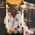 Banner per sfondo cabina fotografica di Halloween con zucca arancione e fantasmi - 180x90cm (DAYX005)