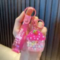 Cute pink cupcake keychain featuring colorful beads and oil-filled liquid base for bag decor - Rose Red