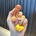 Handgefertigter gelber Enten-Schlüsselanhänger mit Pompon und niedlichem Anhänger - Orange