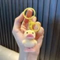 Cute yellow flocked duckling keychain pendant with a matching yellow plastic clip - Yellow