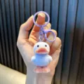 Cute purple flocked little duck keychain pendant with matching plastic ring and lobster clasp - Purple