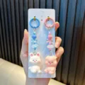 Adorable pig and rabbit resin couple keychain charms for backpacks and phones gift - Back to back