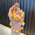 Handmade colorful beaded keychain with cute pink pig and yellow moon charm for bags - Moon