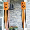 Two orange Halloween pumpkin windsocks hanging for outdoor courtyard party decoration - Pumpkin (FT-002) / 10x100cm