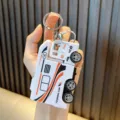Cool white recreational vehicle model keychain with vibrant orange racing stripes - RV Model (5836552528268) / White