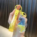 Cute blue and yellow liquid quicksand seahorse keychain with yellow wrist strap - Yellow
