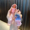 Adorable pink liquid-filled seahorse quicksand keychain with glitter and cute strap - Pink