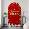 Red arched graduation backdrop with gold Congratulations GRAD text and balloon motifs - Graduation Bright Red Style (SGX-003) - Regular Polyester / 50X120CM