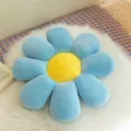 Blue sunflower daisy shaped seat cushion with ribbed corduroy texture on white fur rug - 32cm / Blue