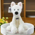Adorable white plush dog toy wearing a cream knitted sweater with a plaid bow tie. - S / Schnauzer Dog