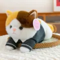 Adorable chubby calico cat plush toy wearing a grey sweater in a soft lying position - 35 cm / Calico Cat