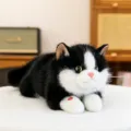 Realistic plush tuxedo cat toy with sound function in black and white variant - 45cm / Black and White