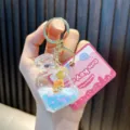 Cute handheld oil-filled tiger perfume bottle keychain charm with blue liquid and stars - Blue