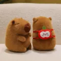Cute Capybara plush toy featuring a unique red apple backpack accessory detail - Apple Backpack