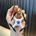Mini-Polizeidrohnen-Modell Schlüsselanhänger in Weiß mit schwarzen Propellern für Taschen - Polizeistil / Weiß