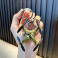 Miniatur-Drohnenmodell-Schlüsselanhänger mit grünem Tarnmuster für Taschen und Schlüssel - Camouflage / Grün
