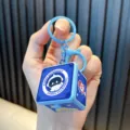 Portachiavi box catapulta 3D blu con simpatico astronauta spaziale per decompressione - Blu