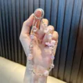 Pink beaded phone chain flower crystal bag pendant cute aesthetic wrist strap charm accessory - Pink