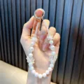 Handmade white pearl and iridescent flower beaded phone strap lanyard wristlet accessory - White
