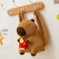 Brown capybara plush backpack featuring a soft fuzzy texture and cute fries accessory. - Capybara Fries Style