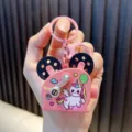 Cute pink movie projector shaped keychain featuring a colorful cartoon unicorn design - Unicorn Pattern / Pink