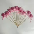 Fanned arrangement of pink glitter foam heart picks with satin bows for wedding decor. - 10 Pcs/Set / Pink