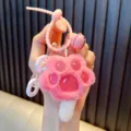 Cute pink plush cat paw keychain with bell and silicone strap for girl's bag charm - Pink