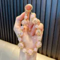Pink crackle bead phone charm strap featuring golden star spacers and a circular ring clasp - Pink (With Phone Gasket)