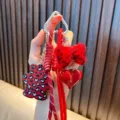 Stylish red leopard print bear keychain with plush ball and heart charm for bags - Red