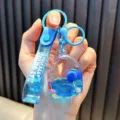 Blue ice cream shaped liquid quicksand keychain with fruit slices and blue strap - Blue