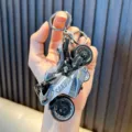 Realistic grey alloy pull-back motorcycle model keychain accessory for backpacks - Gray