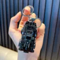 Detailed black tactical police armored vehicle model keychain with a sturdy metal ring - Armored Vehicle