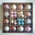 Overhead view of Christmas ornament gift box with assorted pink, gold, and blue balls. - 44 Pieces / Coffee Champagne Gold