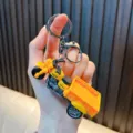 Detailed miniature yellow three-wheeled cargo motorcycle toy keychain with metal ring - Orange