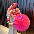 Cute pink variant beaded keychain with plush fur pompom and 'LOVE YOU' heart charm - Dark Pink (Random Beads Tag)