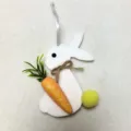 White Easter felt bunny hanging ornament with glittery carrot and yellow pom-pom tail - White