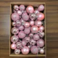 Boxed set of 50 pink Christmas ornaments in various sizes with glitter and matte finishes - 50 Pieces / Pink
