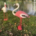 Two realistic plastic flamingo and stork statues for outdoor garden and lawn landscape decoration - Flamingo and Stork