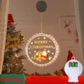 Decorative round LED Christmas window light with Santa design and included gift box - Snowman