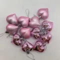 Detail of 12 pink heart-shaped hanging ornaments in mixed matte and shiny finishes - Pink (Shiny Matte)