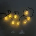 Halloween LED string lights featuring eight glowing skull-shaped bulbs for party decor - Skull