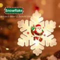 Hanging LED Christmas snowflake ornament featuring Santa Claus with warm glowing lights - Snowflake Single