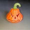 Vibrant orange plastic Halloween Jack-o'-lantern ornament with a carved face and green stem - Angry Pumpkin Regular Style