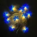 Decorative blue snowflake LED string lights for festive holiday party atmosphere - Snowflake