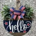 Patriotic wooden door hanger with hello greeting and American flag bow decoration - Navy Blue Hello Style