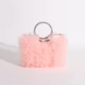 Detailed macro view showing soft pink ruffled tulle texture on sweet style handbag - Pink